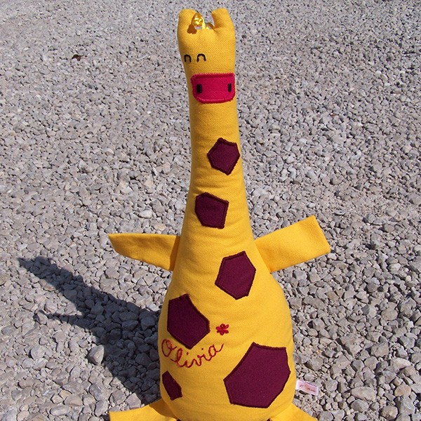 doudou girafe en quille